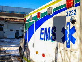 An ambulance waits outside the ambulance bay at the Foothills Medical Centre in Calgary on Monday, December 6, 2021.