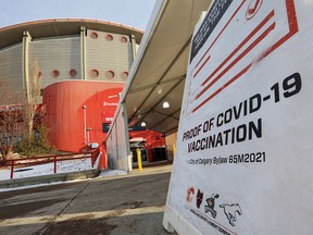 The Scotiabank Saddledome, home of the Calgary Flames, was photographed on Monday, December 13, 2021. The NHL is postponing games after six players and one staff member received positive COVID-19 tests.