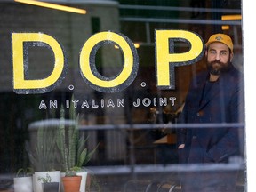 Tony Migliarese, owner of D.O.P Italian Joint, is one of many affected by the Omicron virus sweeping though the city's hospitality sector in Calgary on Tuesday, December 28, 2021.