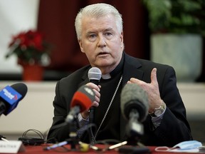 Calgary Bishop William McGrattan speaks at a press conference where Angelina (Angie) Crerar and Gary Gagnon were introduced as Alberta indigenous delegates who will travel to Vatican City this month to meet with Pope Francis, in Edmonton Thursday Dec. 2, 2021.