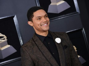 In this file photo taken on January 28, 2018 Trevor Noah arrives for the 60th Grammy Awards in New York.