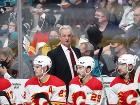 Calgary Flames head coach Darryl Sutter watches his team play the San Jose Sharks during NHL action at SAP Arena in San Jose on Tuesday night.