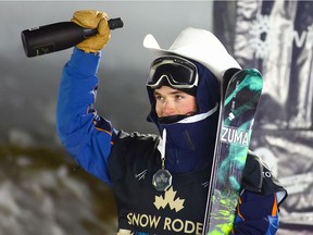 Canada's Brendan Mackay celebrates his gold medal on the podium in the men's World Cup freestyle ski halfpipe event in Calgary on Thursday.