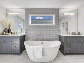 The master ensuite in the Glenbow 26 show home by Cedarglen Homes in Rockland Park.