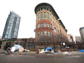 Tents and possessions outside outside the Drop In Centre in downtown Calgary on Thursday, Dec. 2, 2021.