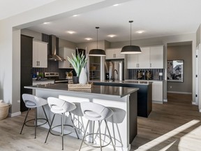 The kitchen in the Jefferson show home by Homes by Avi in Lanark Landing.