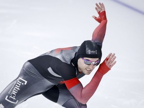 Canada’s Laurent Dubreuil skates to victory in the men’s 500-metre competition at the ISU World Cup speed skating event at the Olympic Oval in Calgary on Friday, Dec. 10, 2021.