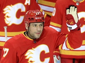 Flames winger Milan Lucic is honoured for playing his 1,000th NHL game in front of the C of Red during the first period of action against the Boston Bruins on Saturday night.