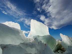 Blue and green ice on an ice ridge on frozen Keho Lake near Nobleford, Ab., on Monday, January 17, 2022.