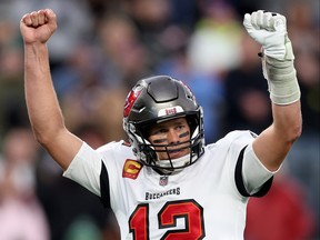 Tom Brady of the Tampa Bay Buccaneers celebrates a successful two-point conversion in the fourth quarter of the game against the New York Jets at MetLife Stadium on Jan. 2, 2022 in East Rutherford, N.J.