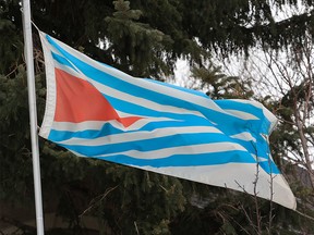 Calgary graphic designer John Vickers’s company designed a new flag for Calgary. The flag was photographed on Thursday, January 13, 2022. The flag, featuring six converging diagonal blue lines, is meant to represent the confluence of the Bow and Elbow Rivers as well as the Treaty 7 Nations.
