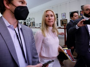 U.S. Representative Marjorie Taylor Greene (R-GA) departs after a news conference to highlight the treatment of jailed January 6th defendants as they await trial, on Capitol Hill in Washington, D.C., Dec. 7, 2021.