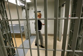 A corrections official walks through the maximum security Edmonton Institution on Jan. 10, 2011.