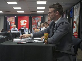 Connor Rankin, a familiar name for hockey fans in this city thanks to stints with the Calgary Hitmen and Mount Royal University Cougars, is now a full-time video analyst for the Flames. In this photo, he was among the staffers in the Flames’ decision room last July for the 2021 NHL Draft.