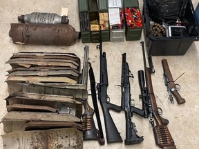 Airdrie RCMP seized thousands of rounds of ammunition, stolen catalytic converters and body armour after searching an Airdrie home on Sunday.