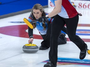 Wild Card 3 skip Emma Miskew delivers a rock as they play Northern Ontario at the Scotties Tournament of Hearts at Fort William Gardens in Thunder Bay, Ont., on Sunday, Jan. 30, 2022.
