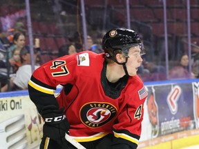 Flames prospect Connor Zary had to deal with an injury before finally settling into the life of a pro hockey player.