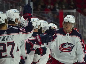 Columbus Blue Jackets winger Patrik Laine is congratulated after his goal against the Carolina Hurricanes at PNC Arena in this photo from Jan. 13.