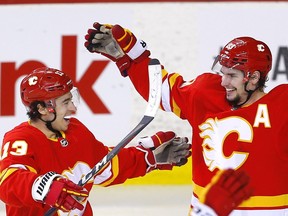 Flames sniper Johnny Gaudreau celebrates a goal on Florida Panthers goalie Spencer Knight during second-period NHL action at the Scotiabank Saddledome in Calgary on Tuesday night. Gaudreau collected four assists in the 5-1 romp over the Panthers.