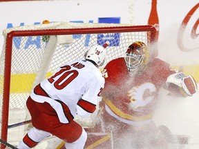 Carolina Hurricanes centre Sebastian Aho scores on Flames goalie Jacob Markstrom during a matchup at the Scotiabank Saddledome in this photo from Dec. 9.