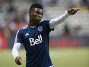 Vancouver Whitecaps FC #3 Sam Adekugbe gestures during warm up prior to playing the LA Galaxy in a regular season MLS soccer game at BC Place stadium, Vancouver  April 04 2015. 