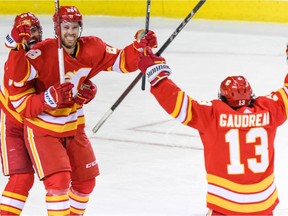 Calgary Flames forward Elias Lindholm celebrates after scoring the game-winning goal against the Winnipeg Jets with less than a minute remaining in the third period at Scotiabank Saddledome on Monday, Feb. 21, 2022.