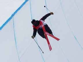 Calgary's Noah Bowman, of Team Canada, performs a trick on his third run during the Men's Freestyle Skiing Halfpipe Final on Day 15 of the Beijing 2022 Winter Olympics at Genting Snow Park on Saturday.