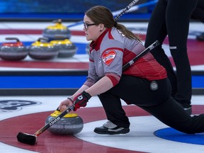 Northwest Territories skip Kerry Galusha, who throws lead stones, delivers as they play Yukon at the Scotties Tournament of Hearts at Fort William Gardens in Thunder Bay, Ont. on Monday, Jan. 31, 2022.