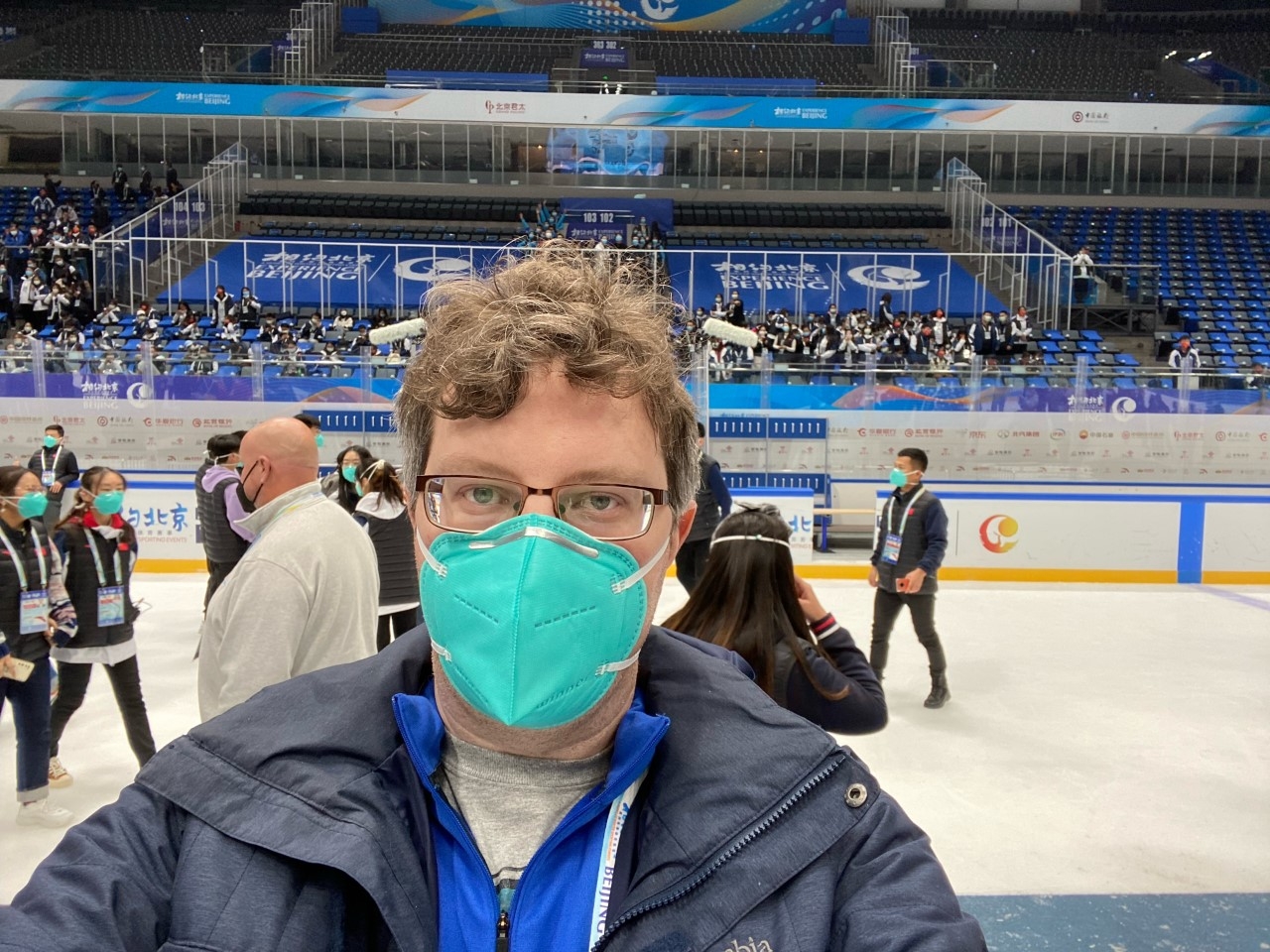 Calgary's Geoffrey Carr keeping time for Olympic hockey in Beijing