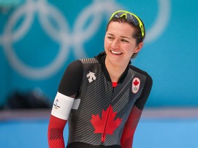 Canada’s Isabelle Weidemann smiles after racing to a silver medal in the women’s 5,000-metre long track speed skating event at the Beijing 2022 Winter Olympics on Thursday, Feb. 10, 2022.