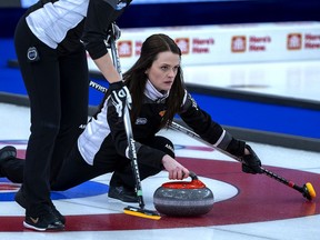 Wild Card 1 skip Tracy Fleury delivers a rock as they play Northern Ontario at the Scotties Tournament of Hearts at Fort William Gardens in Thunder Bay, Ont., on Thursday, Feb. 3, 2022. This was Fleury’s first appearance at the championship after being sidelined in COVID-19 protocol.