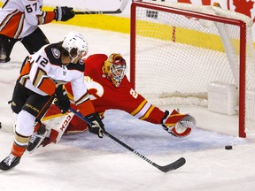 Forward Sonny Milano faces the Flames while playing for the Anaheim Ducks on February 16, 2022.