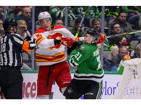 Nikita Zadorov (left) and the Calgary Flames cut down Jason Robertson and the Stars with a late comeback last night at American Airlines Center in Dallas.  
Jerome Miron/USA TODAY Sports