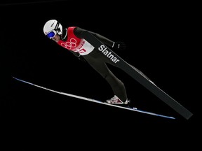 Team Canada ski jumper Mackenzie Boyd-Clowes competes in the men’s large hill individual first round during the Beijing Olympic Winter Games in Zhangjiakou, China, on Saturday, Feb. 12, 2022.
