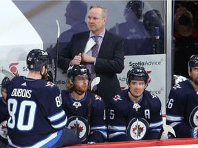 Winnipeg Jets interim coach Dave Lowry behind the bench against the Florida Panthers in Winnipeg on Tues., Jan. 25, 2022.