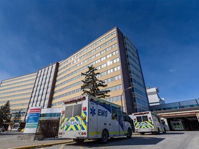 Ambulances outside the emergency entrance at Foothills hospital on Thursday, March 10, 2022.