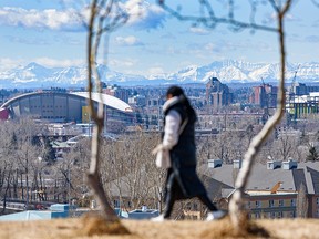 People spend the pleasant early spring afternoon in Tom Campbell’s Hill on Tuesday, March 29, 2022.