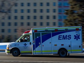 An ambulance heads toward the Foothills hospital on Monday, December 6, 2021.
