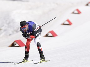 Brian McKeever of Team Canada competes in the men’s visually impaired classic ski race at the Zhangjiakou National Biathlon Centre during the Beijing 2022 Winter Paralympics on Monday, March 7, 2022.