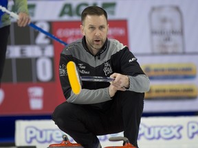 Wild Card 1 skip Brad Gushue gives instruction to his team during the Brier final against team Alberta. Gushue beat Kevin Koe's team 9-8 in extra ends.