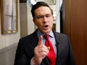 Conservative party leadership candidate Pierre Poilievre speaks to journalists on Parliament Hill in Ottawa, Feb.16, 2022.