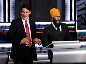 Liberal Leader Justin Trudeau and NDP Leader Jagmeet Singh take part in the federal election English-language debate in Gatineau September 9, 2021.