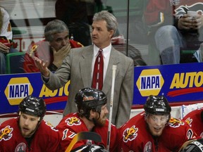Calgary Flames coach Darryl Sutter gestures during the 2004 Stanley Cup final against the Tampa Bay Lightning.