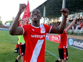 Cavalry FC’s Elijah Adekugbe celebrates a win during a game at ATCO Field at Spruce Meadows in 2019.