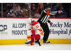 Calgary Flames left-winger Johnny Gaudreau celebrates after scoring the winning goal against the Colorado Avalanche in overtime at Ball Arena.