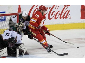 Matthew Tkachuk of the Calgary Flames has a chance in front of goalie Karel Vejmelka of the Arizona Coyotes dung the first period of action as the Calgary Flames host the visiting Arizona Coyotes at the Saddledome. March 25, 2022. Brendan Miller/Postmedia