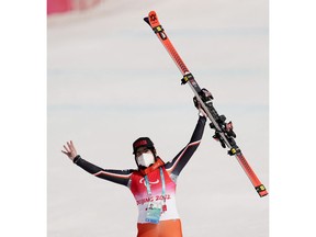 Alana Ramsay of Canada celebrates after her bronze-medal run in the para alpine women's standing event yesterday at the 2022 Beijing Paralympic Games.