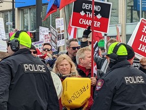 Tensions ran high as "freedom rally" protesters and local residents clashed in the Beltline on 17th Avenue S.W. on Saturday, March 5, 2022.