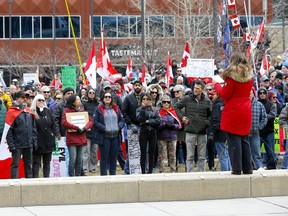 Police and Bylaw officers kept a close watch on the Freedom rally held at Harley Hotchkiss Gardens in Calgary on Saturday, March 26, 2022.