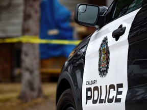 FILE - A Calgary Police car is seen at the scene of a crime.